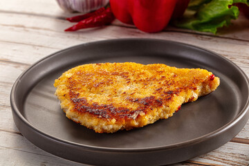 Breaded crispy chicken schnitzel