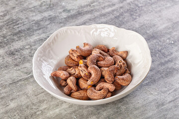 Unpeeled cashew nuts in the bowl