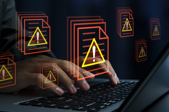 Data breach or information leak due to insider threats or unauthorized access. Confidential files and warning triangle icons. Hacker using laptop computer to steal documents.