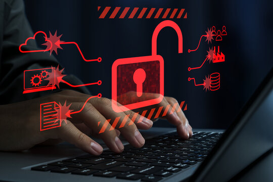 Cyberattack. Unauthorized access and corporate networks intrusion. Hacker using laptop computer to steal confidential data. Unlocked padlock icon.