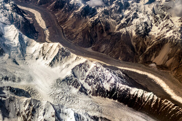 Aerial View of Majestic Snow-Capped Mountain Range with Glacier Over Karakoram, Pakistan
