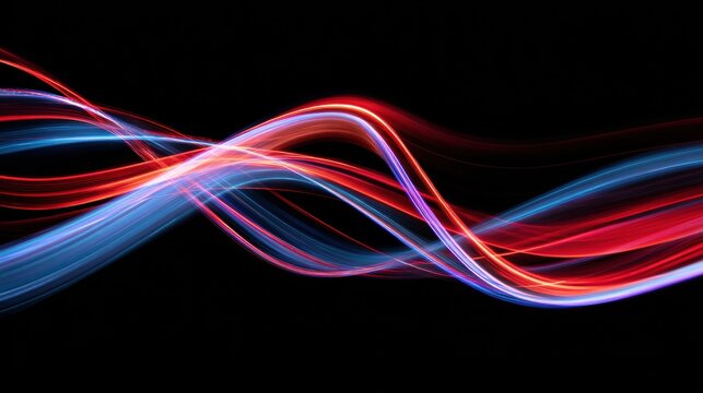 Abstract, red and blue light trails weaving against a stark black background.
