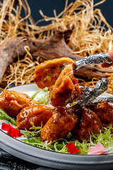 Molecular vegetable chicken wings and fried assorted vegetables
