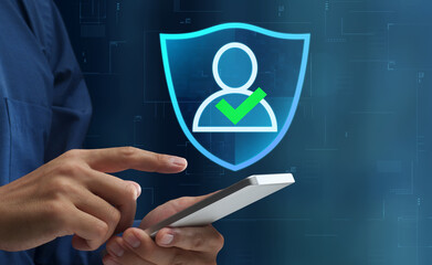 Identity authentication technologies. Secure passwordless multi-factor authentication. Businessperson tapping smartphone screen to use authenticator application.