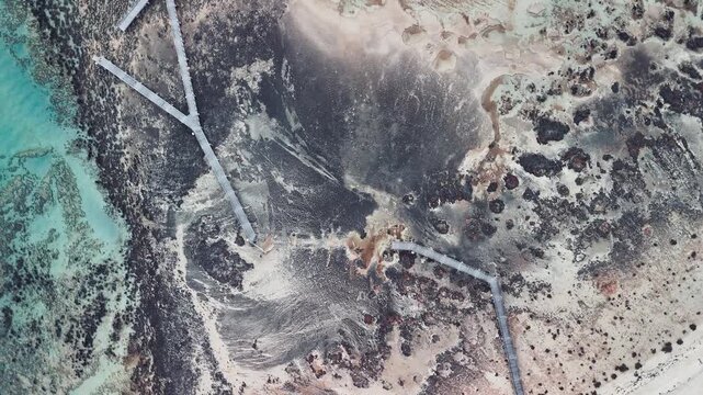 Aerial view of Hamelin Pool in Western Australia showing turquoise waters and stromatolites
