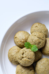 Close-up of homemade mint cookies on a white plate