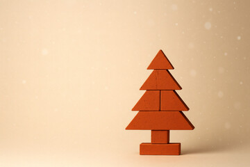 Fototapeta premium Geometric Brick Christmas Tree on Beige Background