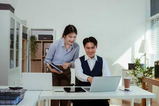 Asian young business people discussing on performance revenue in meeting. businessman working with co-worker team. financial adviser analysing data with investor.