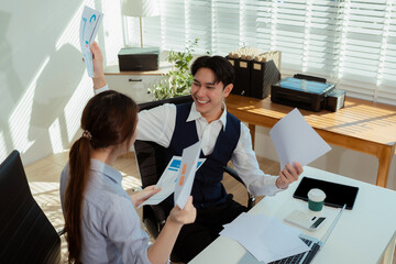 Happy smiling businessman feel happy work complete Teamwork success, success at work in the office concept.