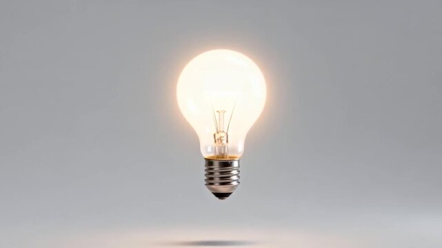 Minimalist floating light bulb with soft halo glow in empty studio background, clean commercial style, perfect for epiphany