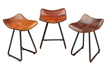 Three brown leather stools with black metal legs against a black background