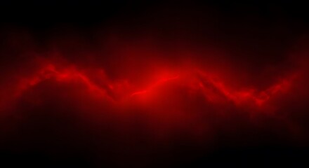 Fototapeta premium Dramatic red light streaks across a dark backdrop creating intense visual impact and a sense of mystery, perfect for edgy designs or powerful statements