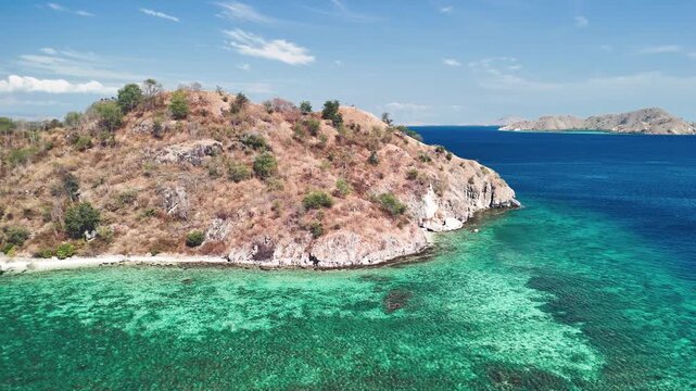 Drone view of Pulau Kelor Komodo with crystal clear waters and tropical island landscape