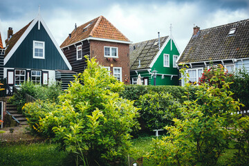 Traditional Dutch house with colorful wooden facade in Volendam fishing village, Netherlands architecture travel photo