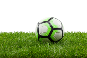 Soccer ball resting on green grass with copy space, close-up sports equipment concept for training, youth league and outdoor recreation on a clean white background