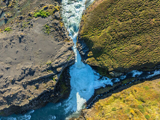 Aerial view of a river around the Barnafoss falls in Iceland