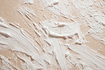 Textured surface with white paint and subtle patterns