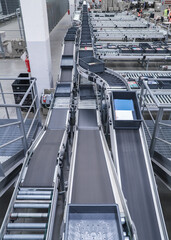 packing line in a logistics warehouse. conveyor belt in a modern production line