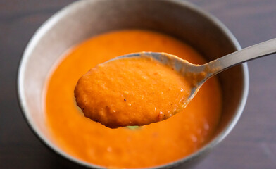 Close-Up Spoonful of Roasted Tomato Soup – Cozy Autumn Comfort Food