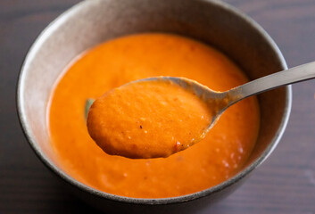 Close-Up Spoonful of Roasted Tomato Soup – Cozy Autumn Comfort Food