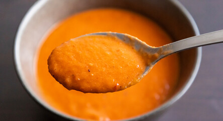 Close-Up Spoonful of Roasted Tomato Soup – Cozy Autumn Comfort Food