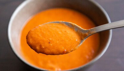 Close-Up Spoonful of Roasted Tomato Soup – Cozy Autumn Comfort Food