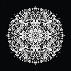 Highly detailed black and white mandala featuring a central flower surrounded by ornate patterns and gracefully arranged birds.