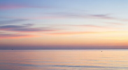 A person walks along the ancient stone Great Wall of China, winding through mountainous terrain under a clear sky.