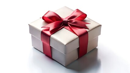 Obraz premium Elegant gift box with red ribbon and bow on white background for special occasions and celebrations