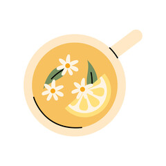 Lemon chamomile tea cup with citrus slice and flowers in warm cozy drink top view