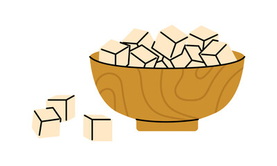 Wooden bowl full of sugar cubes with extra pieces beside it, perfect for warm tea and kitchen decor