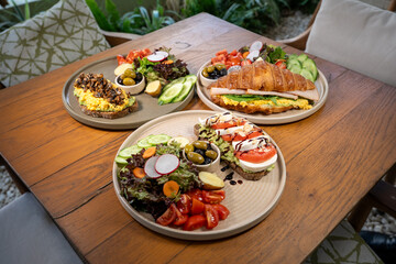 Delicious breakfast croissant sandwich filled with fresh ingredients
