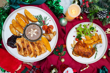 Delicious holiday meals arranged on a festive table setting, inviting a sense of warmth and enjoyment