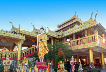 figure of Buddha and Buddhist palace in Xishuangbanna,China