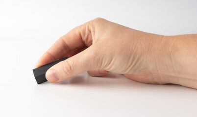 Eraser on paper. Erasing what was written, deleting an error, correcting mistake