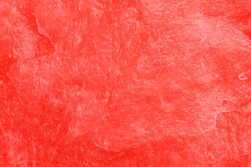 Fototapeta premium Abstract red textured background with subtle brush patterns and grunge effects. Bright red dominates the entire surface.