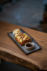 Creative sushi sandwich presented with clean, minimalist food styling.