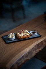 Creative sushi sandwich presented with clean, minimalist food styling.