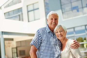 Portrait, senior or happy couple with outdoor hug by new home, real estate or retirement investment. Property purchase, support or old people smile for relocation, embrace or love for future together