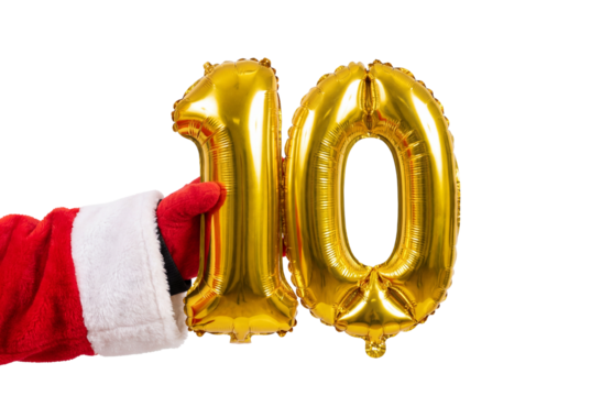 Hand in red and white festive sleeve holding gold number ten balloons on white background, holiday countdown and celebration concept for Christmas party or New Year event