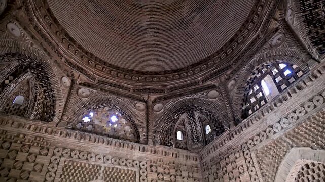 A close look at interior patterns, arches, and brick details inside the Ismail Samani tomb in Bukhara, Uzbekistan.