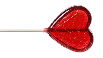 Red lollipop in heart shape on white or green background, an isolated sweet target for accuracy in a game of darts and a symbol of love