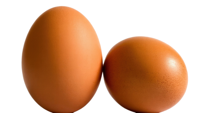 Two brown chicken eggs of different sizes are prominently displayed on a vibrant transparent background, showcasing their natural texture and form. background removed