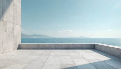 Obraz premium Empty concrete terrace with modern tiled floor, serene sea view. Large outdoor patio overlooks calm ocean, distant city skyline. Architectural space provides clean, spacious background for product