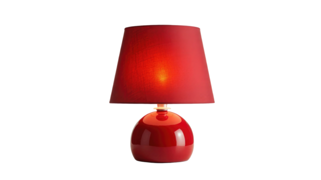 A vibrant red table lamp with a textured fabric shade and a glossy spherical base, glowing warmly. background removed