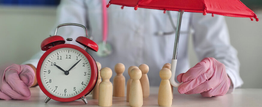 Medical professional underscores importance of time management and patient care with alarm clock and umbrella concept