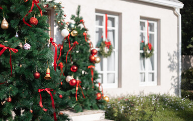 close-up view, christmas tree with item to decorate and window have christmas wreath hanging on, celebrate in christmas holiday