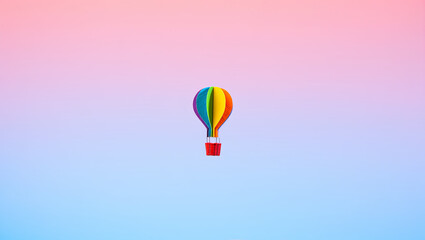 Naklejka premium Colorful hot air balloon floats against a pastel sky during sunrise above a scenic landscape
