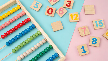 Colorful counting tools and number blocks arranged on a blue and pink surface for early childhood learning activities