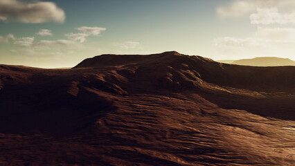 An expansive desert unfolds, revealing rugged terrain and undulating hills as the sun sets. Soft clouds drift by, creating a beautiful contrast against warm hues of the horizon.